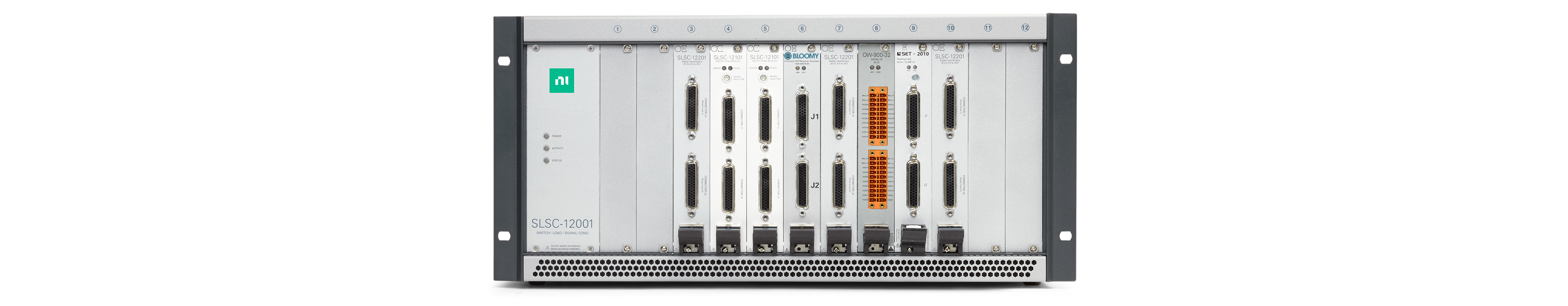 A SLSC-12001 chassis that includes modules from a number of different vendors for signal routing, signal conditioning, and sensor simulation.
