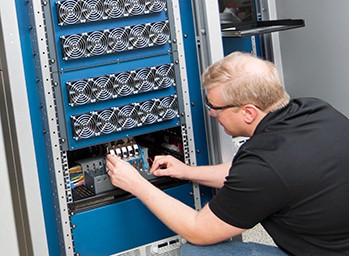 A PXI chassis filled with DC, analog, and digital instrumentation