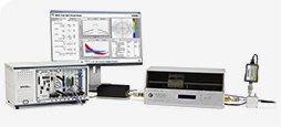 PXI system, computer screen, microwave tuner, and power meter on a test bench