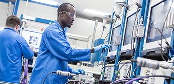 A FitTech operator working on high throughput testing for miniLED