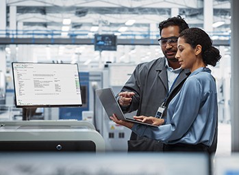 engineers analyzing test data on the computer