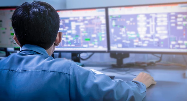 An engineer monitors his test environment remotely.