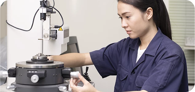 Engineer tests the durability of a component