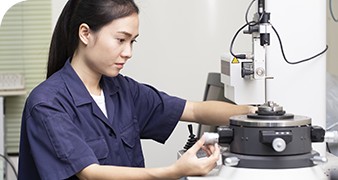 Engineer working with electronic components