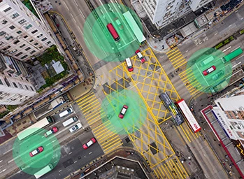 aerial view of traffic intersection showing vehicles with ADAS technology