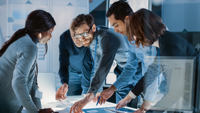 Engineers meeting in technology research laboratory
