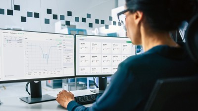 engineer reviewing test results