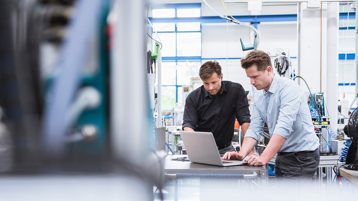 Engineers working together in a lab