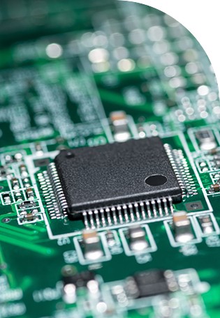 Close up view of a printed circuit board highlighting components and connections fixed to it
