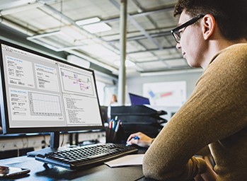 Engineer designer working on desktop computer