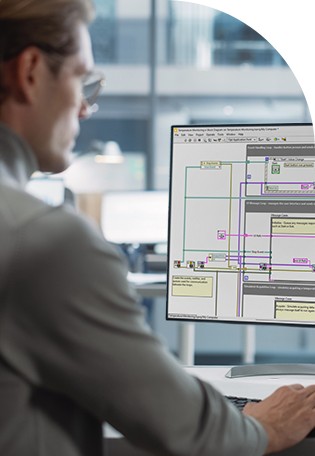 Software developer programming in NI LabVIEW for automated test