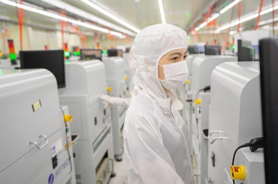 A FitTech operator working on high throughput testing for miniLED