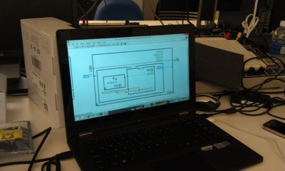 After completing a basic LabVIEW introduction, students worked in teams to build a smart four-way stop sign in LabVIEW on their laptops.