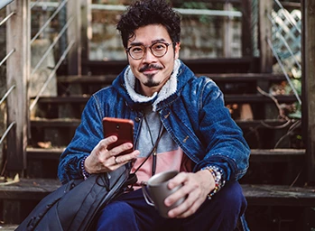 A man connects to a 5G network from his mobile device