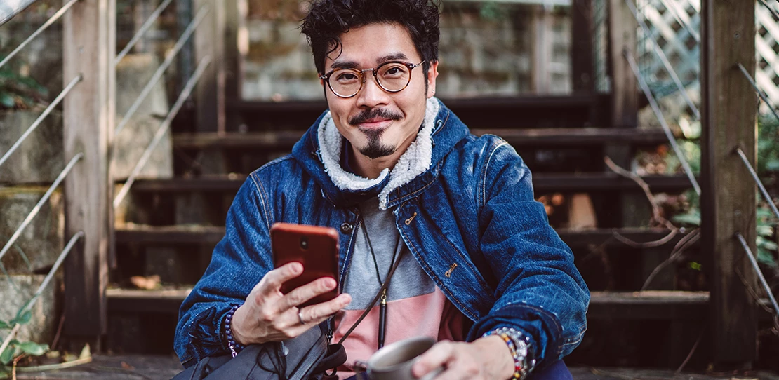 A man connects to a 5G network from his mobile device