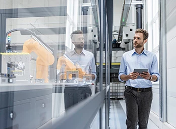 test engineer observing machinery