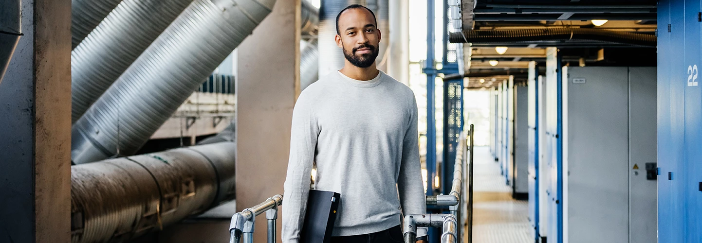 engineer holding a laptop