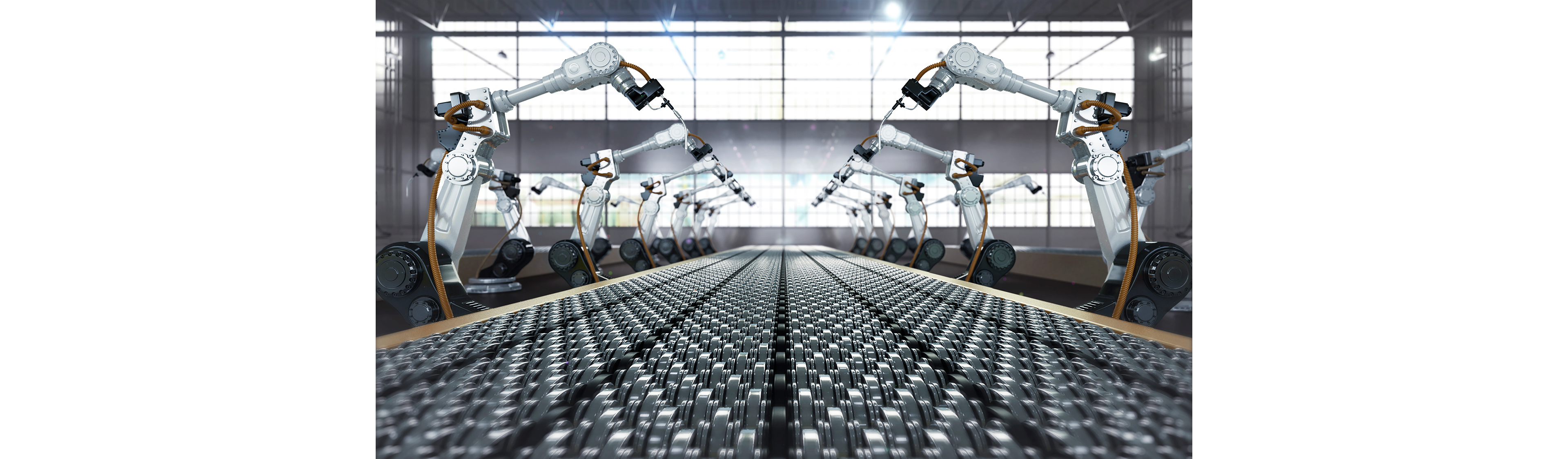 Bras robotiques fonctionnant le long d'un tapis roulant, illustrant le contrôle automatique en temps réel et la surveillance de précision permise par LabVIEW Real-Time.