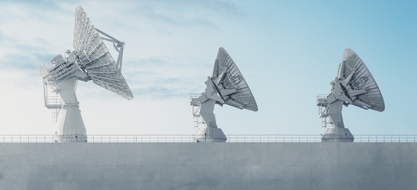 three large radar dishes