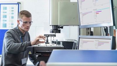 engineer testing and inspecting a device