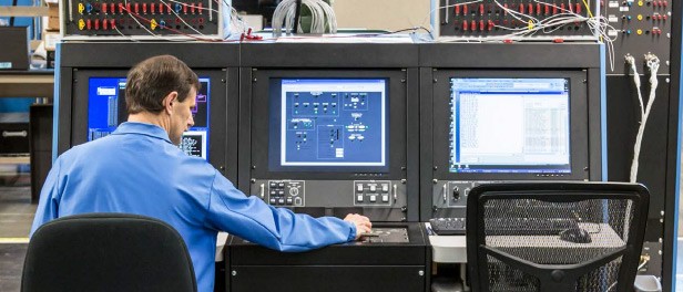 Engineer working with LRU test equipment