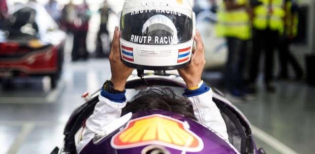 Drivers don their helmets in final preparation before the Shell Eco-marathon