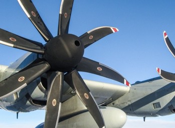 A sideways view of propellers on an aircraft