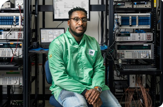engineer in front of NI hardware