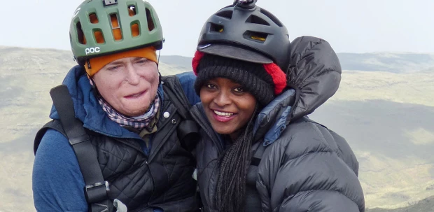 Alex Lewis and Emebet Dires at the top of Ras Dashen after ascending using an electrically-assisted handcycle