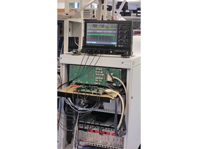 Product under characterization, the PXI system resides below the load board