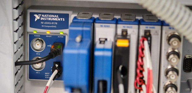 Close-up of NI CompactDAQ hardware used to acquire data from sensors testing critical care ventilators during the COVID-19 pandemic.