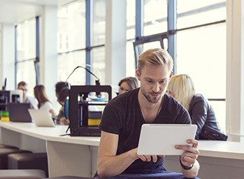 A man connects to a 5G network from his mobile device